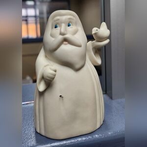 White Ceramic Santa Figurine with Dove